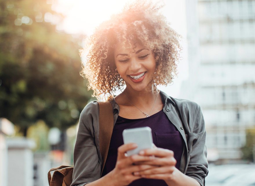 Woman looking at phone.